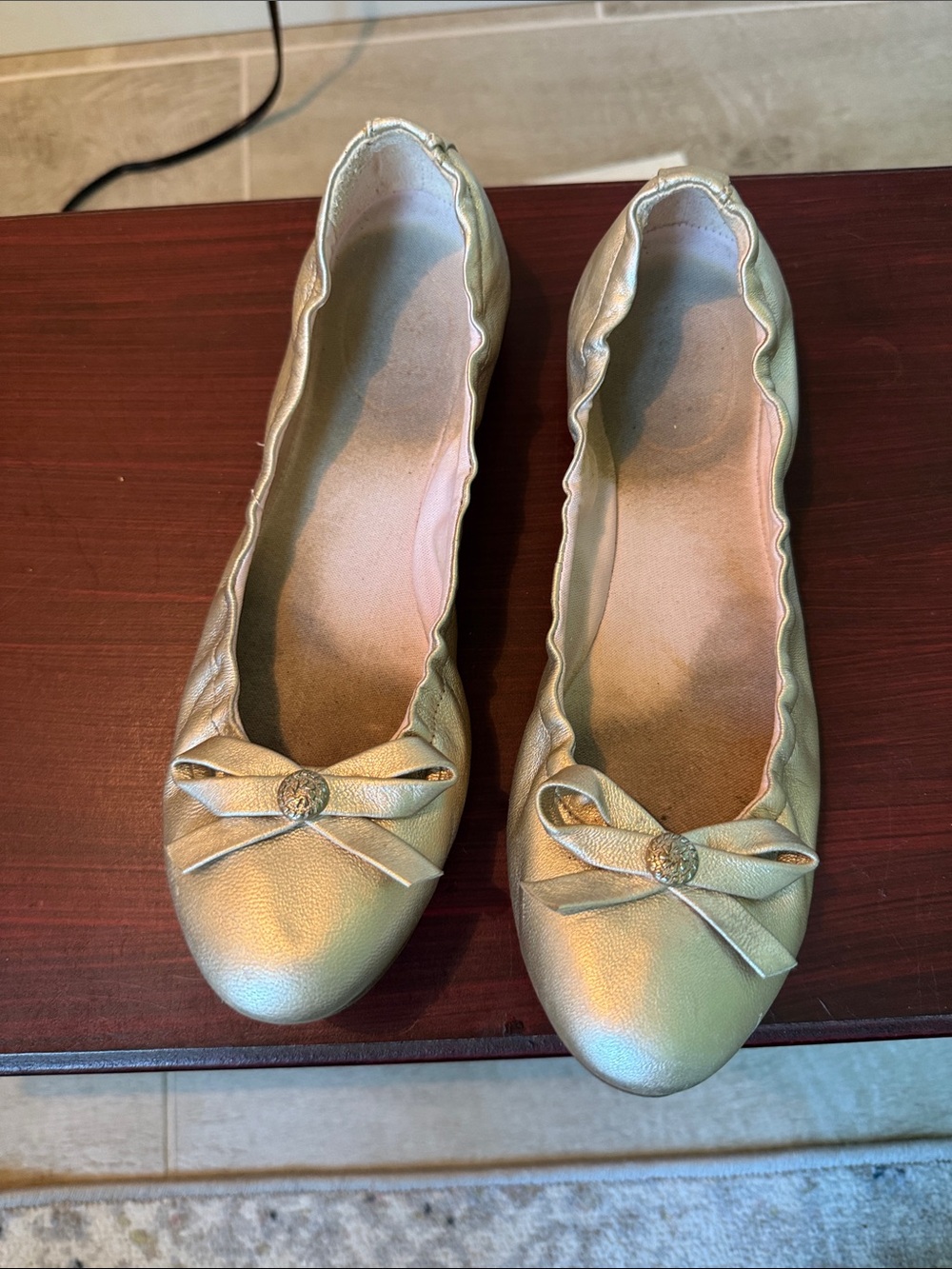 Jack Rogers Women’s Metallic Gold Ballet Flats with Bow